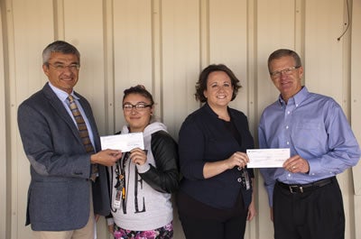 Robert E. Castillo at check presentation at Future Foundations Family Center