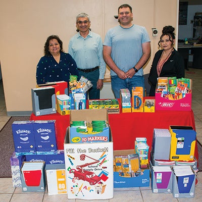 CDEC and Homestake employees with school supply donations