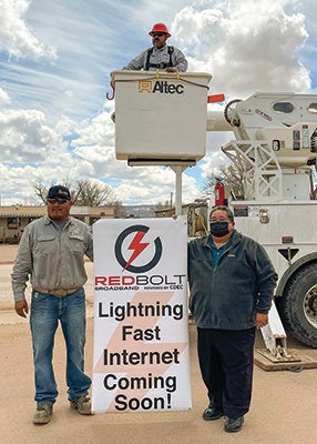 Zuni governor holds Red Bolt banner