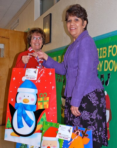 Photo of members who donated money for coats